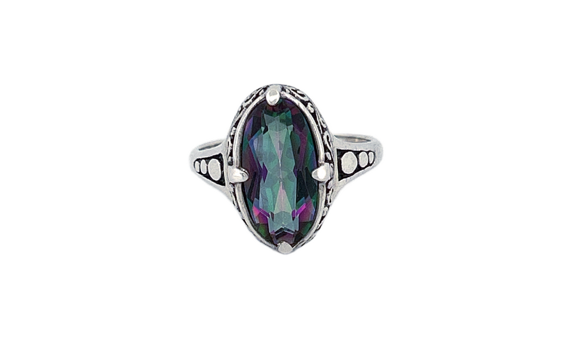 Sterling Silver Mystique Topaz Ring – Oval Cut Design