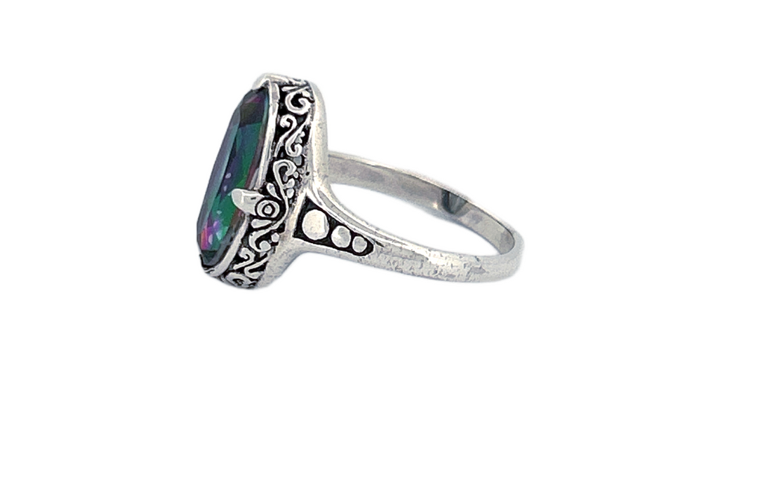 Sterling Silver Mystique Topaz Ring – Oval Cut Design