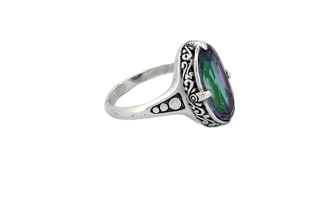 Sterling Silver Mystique Topaz Ring – Oval Cut Design