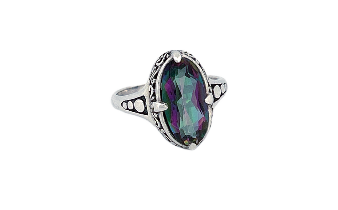 Sterling Silver Mystique Topaz Ring – Oval Cut Design